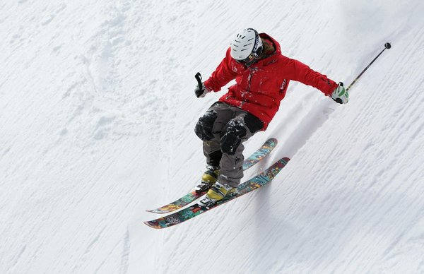 What rehabilitation exercises enhance knee stability for skiers post-injury?